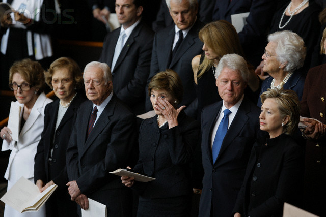 14 Jul 2007, Austin, Texas, USA --- (L-R) Former first lady Nancy Reagan, former first lady Rosalynn Carter, former president Jimmy Carter, first lady Laura Bush, former president Bill Clinton and former first lady and senator Hillary Clinton (D-New York) stand during the funeral services for Lady Bird Johnson at Riverbend Church in Austin. --- Image by © David Phillip/Pool/Corbis