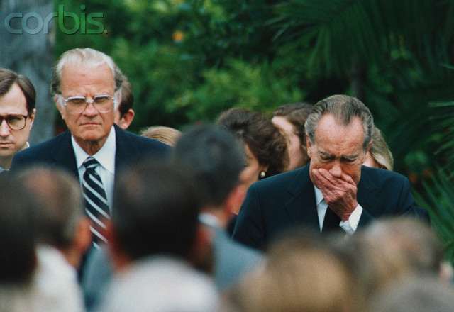 Reverend Billy Graham and a grieving Richard Nixon arrive at memorial services for former First Lady Pat Nixon, at the Nixon Presidential Library in Yorba Linda, California. 
