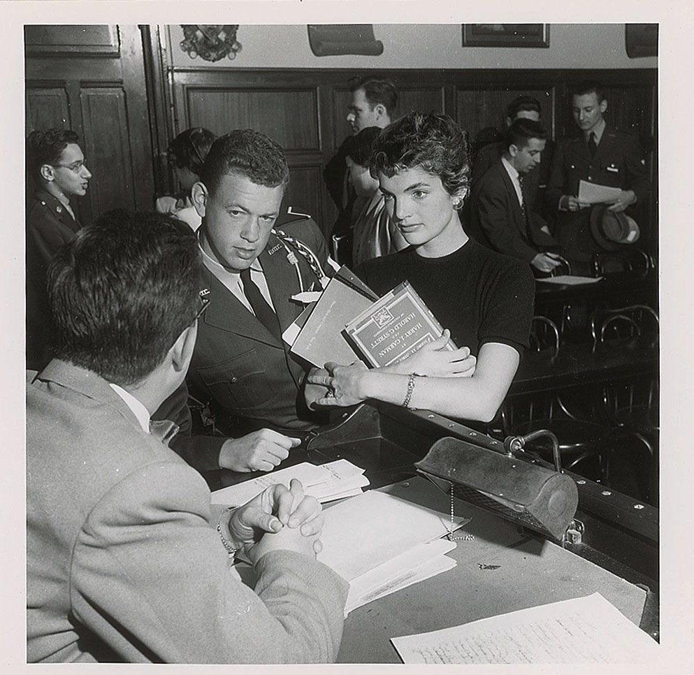 After class, Jackie Kennedy waits to speak with her professor. He later helped her with research for her husband's book, Profiles in Courage.