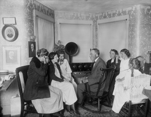 John Coolidge with friends listen by radio to his son's acceptance speech of the 1924 Republican nomination for President from his Vermont farmhouse. 