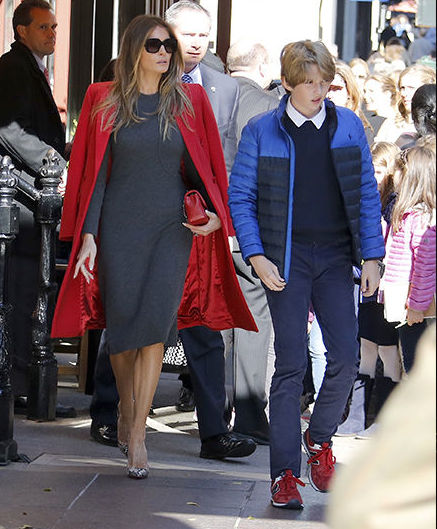 Melania Trump exits New York restaurant Serafina with her son Barron. (TMZ)
