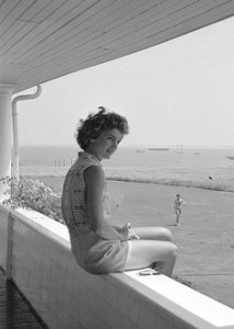 Jackie Bouvier looking out to sea from the porch of her future in-laws in one of the engagement picture taken by Life magazine.