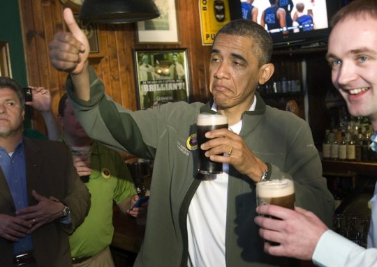 The President enjoying a cold one on St. Patrick's Day. (globalgrind.com)
