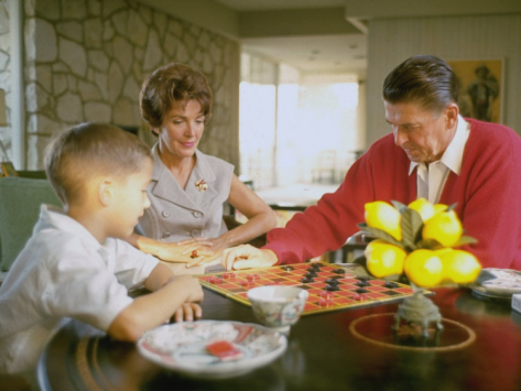 The Reagans playing checkers with son Ron. (Bill Ray)
