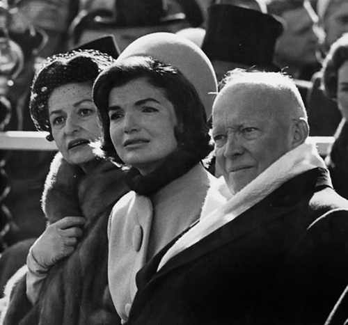 Mrs. Johnson, Mrs. Kennedy and former President Eisenhower looking with concern at the podium as poet Robert Frost spoke. Mrs. Johnson, Mrs. Kennedy and former President Eisenhower looking with concern at the podium as poet Robert Frost spoke.