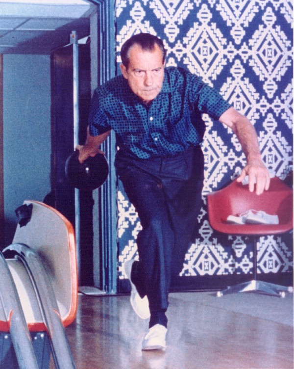 President Nixon bowling in the lanes at the Old Executive Office Building.