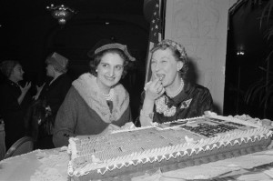 Mamie Eisenhower with Helen Thomas eating birthday cake at the First Lady's 1959 birthday party luncheon hosted by the Women's National Press Club. (Corbis)