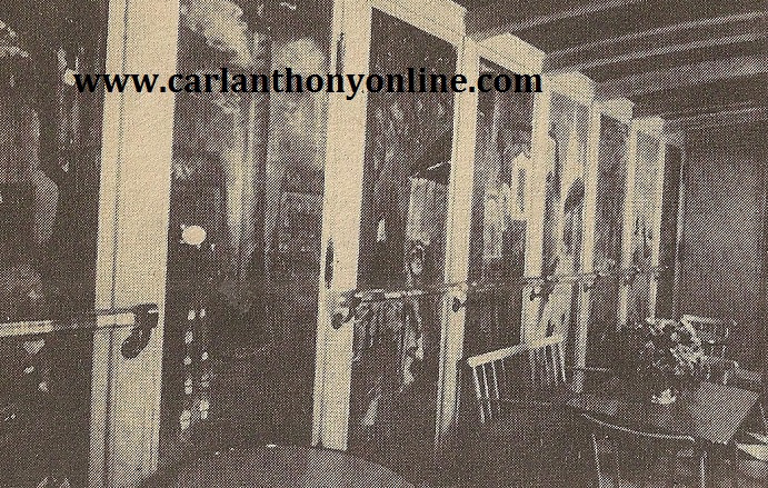 An outside dining area with trompe l'oeil painted glass doors.