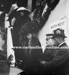 Daughter Helene behind her, Nellie Taft descending stairs from a suffrage parade she reviewed the day before she left the White House.