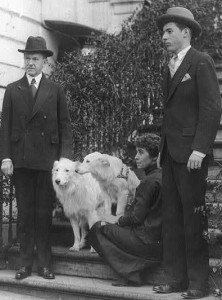 The President and Mrs. Coolidge, their son John and two white collies Rob Roy and Prudence Prim.
