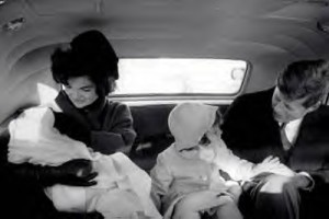 The President and Mrs. Kennedy united with their children on their way to the White House together for the first time, February 1961.