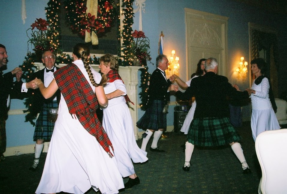 Adults doing the square dancing known, appropriately enough, as the Scottisch.