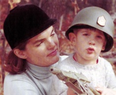 The First Lady and her son, who she taught to salute. (www.pinterest.com) 