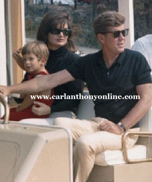 The President and Mrs. Kennedy with son John at the family's weekend home.