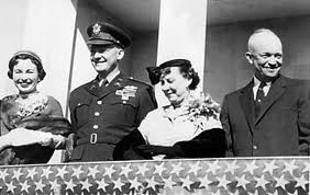 Barbara and John Eisenhower join Mamie and Dwight Eisenhower at a public ceremony,