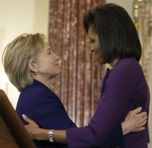 Hillary Clinton hugs Michelle Obama at a March 11, 2009 State Department ceremony. (Alex Brandon)
