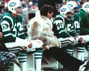 Namath in yet another one of his famous fur coats, along with the white sneakers he insisted on wearing.