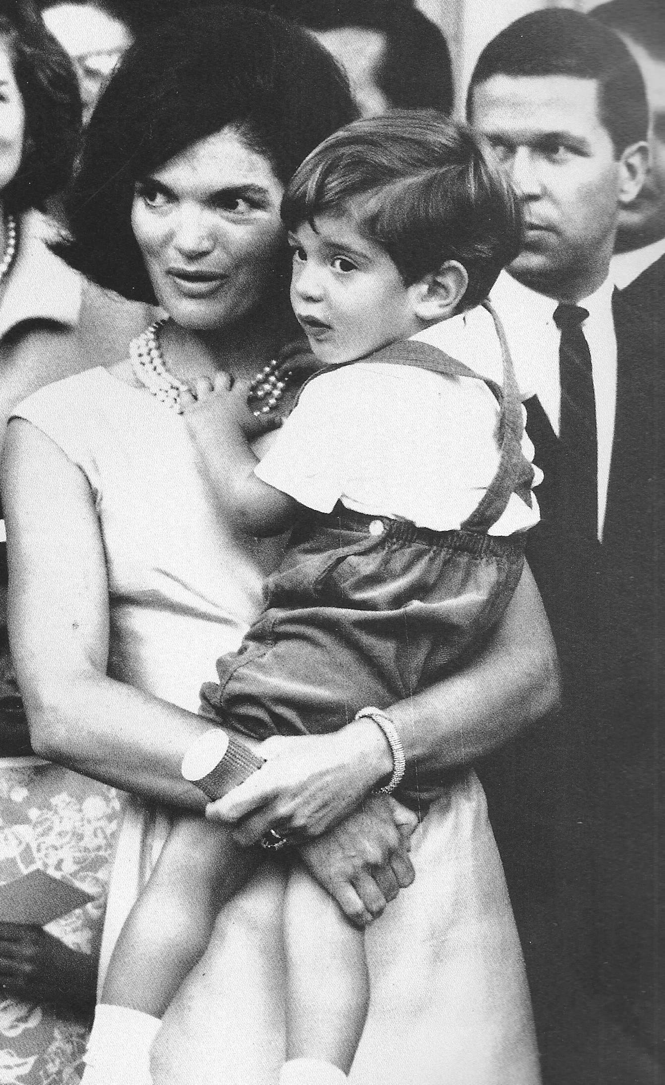 His mother carried John onto the White House North Portico to meet some astronauts, 1963. His mother carried John onto the White House North Portico to meet some astronauts, 1963.