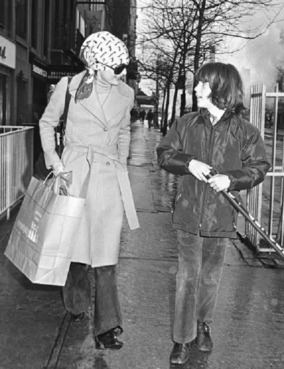 Jackie Onassis strolls Paris with her son after shopping, 1972. Jackie Onassis strolls Paris with her son after shopping, 1972.