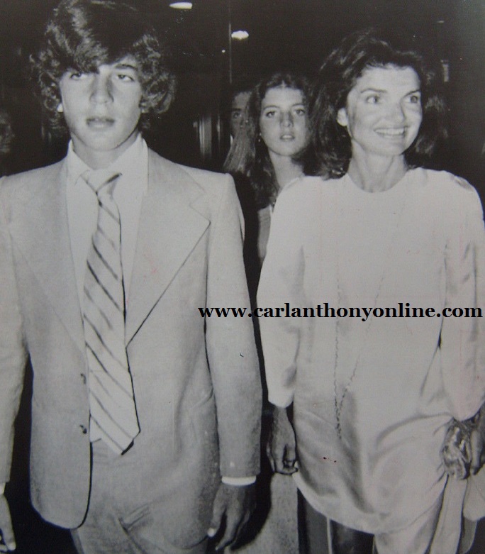 Jackie Onassis with John and Caroline Kennedy leaving a party in conjunction with the RFK Tennis Tournament, August 28, 1976. Jackie Onassis with John and Caroline Kennedy leaving a party in conjunction with the RFK Tennis Tournament, August 28, 1976.