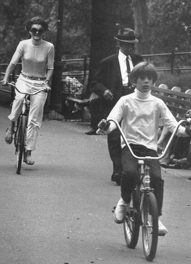 Mother and son biking together through Central Park, 1969. Mother and son biking together through Central Park, 1969.