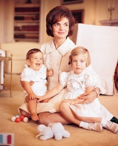 The First Lady with her children just nine months after they entered the White House. The First Lady with her children just nine months after they entered the White House.