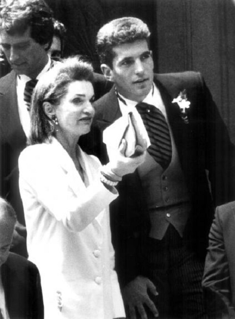 Jackie Onassis points out something of significance in front of St. Matthew's Church in Washington, D.C. following a family wedding: it was here that John famously saluted his father after the president's funeral mass in the church, 1987. Jackie Onassis points out something of significance in front of St. Matthew's Church in Washington, D.C. following a family wedding: it was here that John famously saluted his father after the president's funeral mass in the church, 1987.