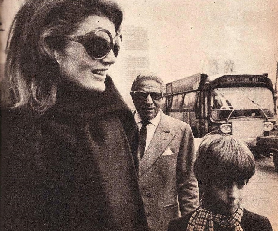 Jackie Onassis with her husband and son, 1969. Jackie Onassis with her husband and son, 1969.