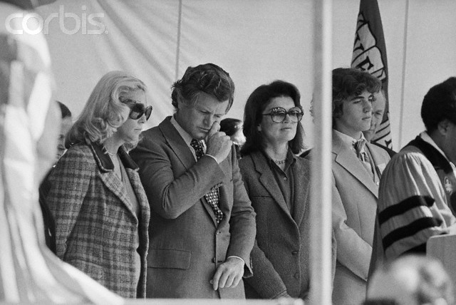 Jackie and John are joined by Joan and Teddy Kennedy at a ceremony for the JFK School of Government, 1978. Jackie and John are joined by Joan and Teddy Kennedy at a ceremony for the JFK School of Government, 1978.