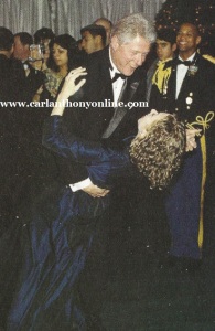 President Clinton dips his daughter in a dance.