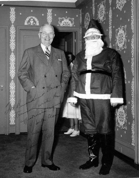 President Harry Truman with an Atomic Age Santa Claus. (HSTL)