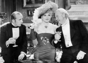 Mae West enjoyed a few bottles of champagne with her "high hat" pals before they all head to toast in the new century.