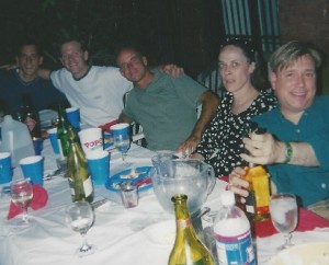 Matt V., Jim H., David M. and Ellen enjoying a summer meal al fresco with a crew of pals. Eddie too, of course.