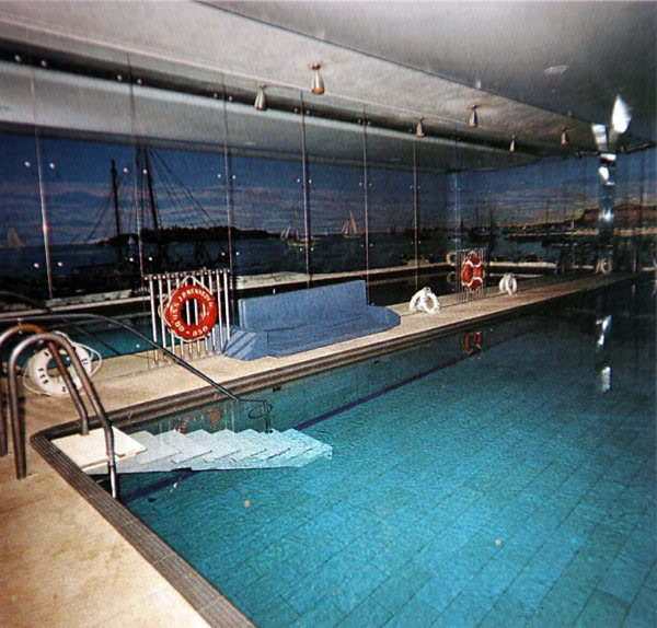 The White House pool as upgraded and renovated by President Kennedy, including a mural of the South of France commissioned by his father.