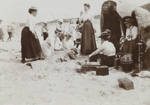 A group of workers gather for summer fun at the shore, 1902.