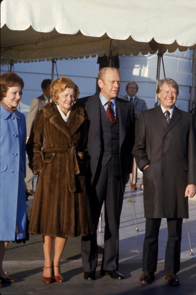 The Carters and Fords pose together on the grounds of the White House, Washington DC, November 22, 1976. From left, soon-to-be First Lady Rosalynn Carter, First Lady Betty Ford, President Gerald Ford, and president-elect Jimmy Carter. (Photo by Walter Bennett/The LIFE Images Collection/Getty Images)