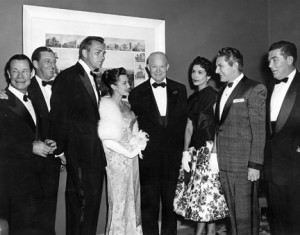 Eisenhower with (left to right) Brown, Bolger, Keel, Russell, Horne, Liberace, and  Richardson.