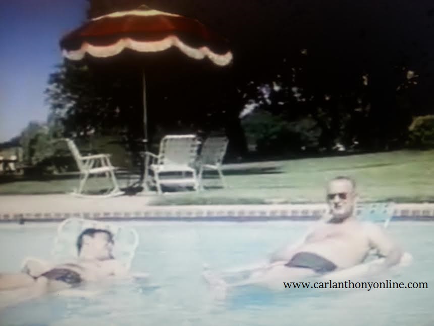 LBJ enjoying a lazy moment in the sun, floating in a pool chair at the LBJ Ranch. 