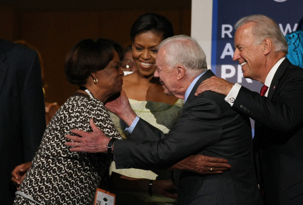 Carter goes to apparently kiss Marian Robinson, the First Lady's mother.