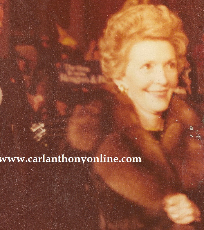 During her post-election visit to Washington, Nancy Reagan entering the F Street Club for a pre-Inaugural dinner with Washington's social and political elite.