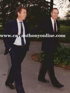 W. walks the White House South Lawn with his dad during the first Bush presidency.