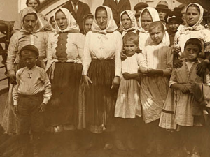 Polish immigrant women still in their traditional garb, arriving at Ellis Island on their way to becoming Americans.