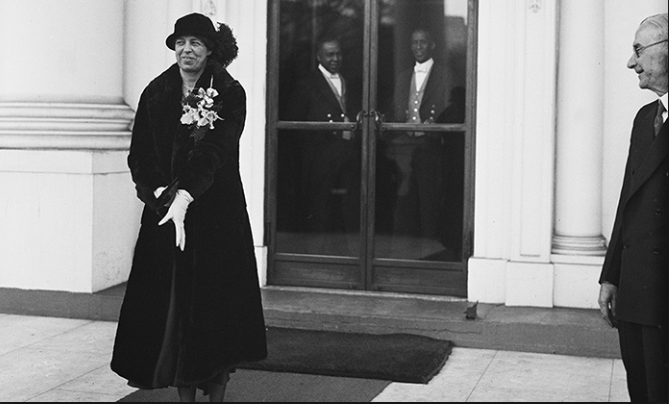 Eleanor Roosevelt leaving the White House after her tour of it with Lou Hoover.