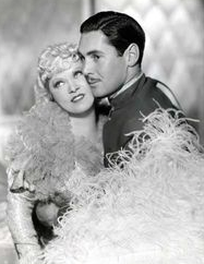 Cheek to cheek: Phillip Reed was one of Mae West's sweet gents in 1936's Klondike Annie.