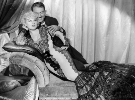She could take him or leave him: Victor McLaglen, the rough sea captain and Mae West, 1936.