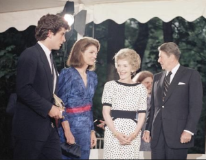 John Kennedy, Jr. and his mother Jacqueline Kennedy Onassis welcome Ronald and Nancy Reagan to the June 1985 fundraising event.