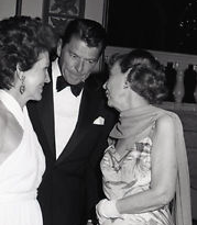 Ronald and Nancy Reagan confer with Mamie Eisenhower.