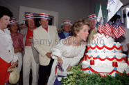 Nancy Reagan blows out her July Fourth birthday cake candles. (RRPL)