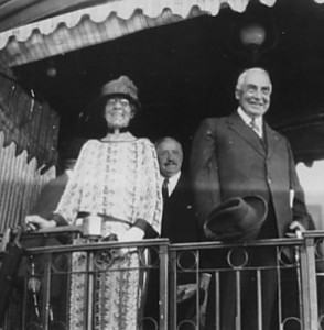 Smiling for the press in Alaska, President Warren Harding and First Lady Florence Harding.