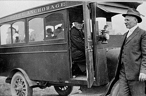 The Hardings being transported by bus to the Anchorage Hotel, one of Alaska's finest.